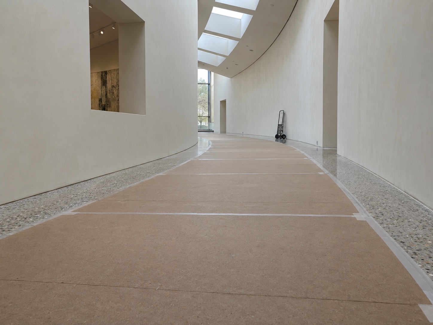 Temporary floor boards forming a protected gallery route